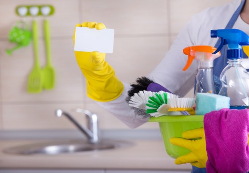 Professional home cleaners servicing a modern TW1 home interior
